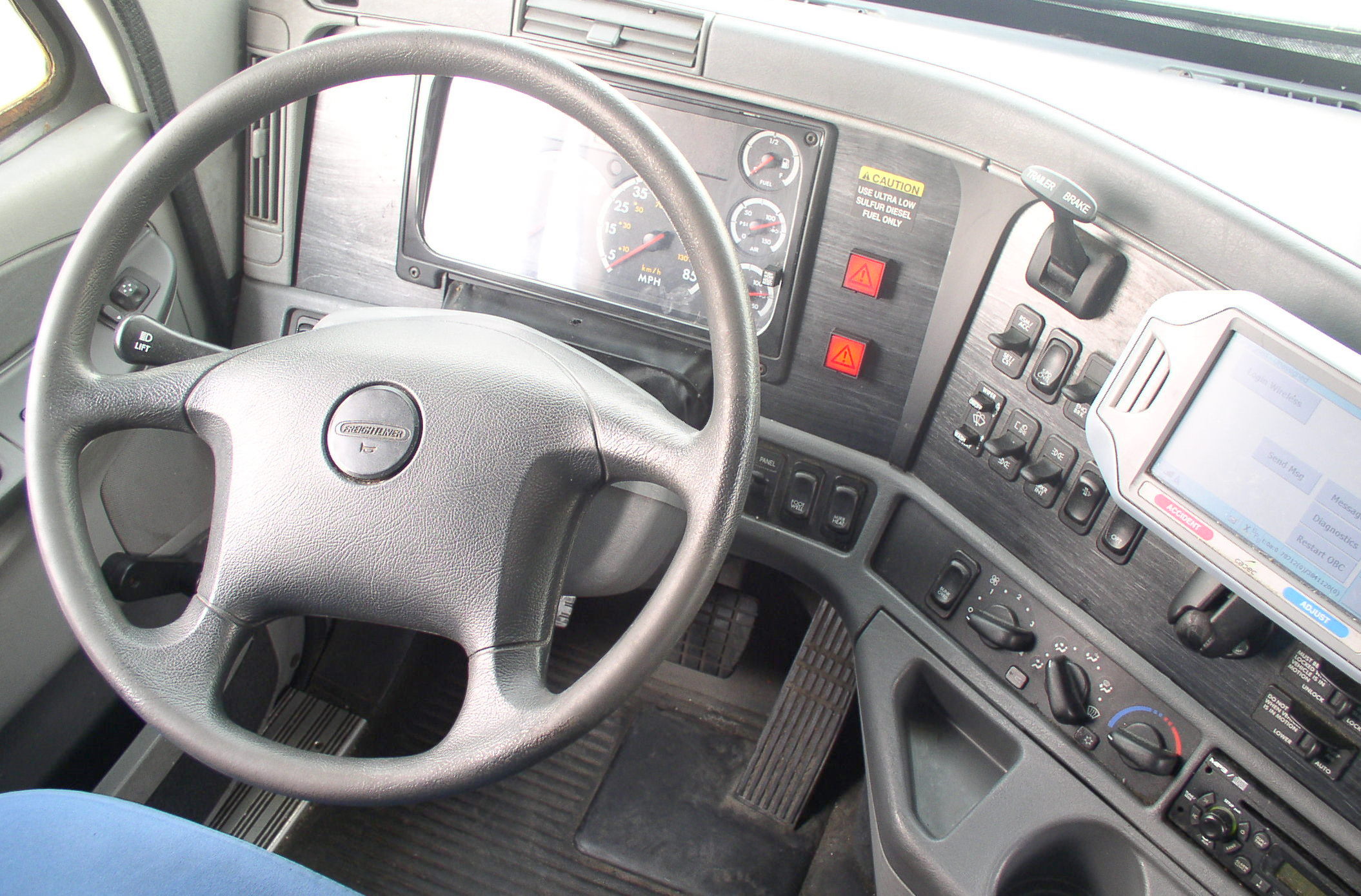 Interior controls of a Freightliner truck cab